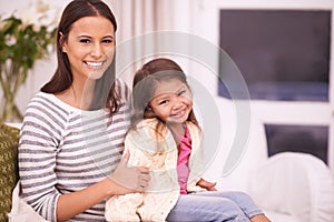 Portrait, mother and relax girl with smile for embrace in living room with love, care and happiness. Apartment, mom and