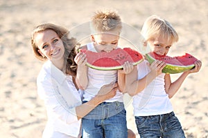 Portrait of mother and two sons