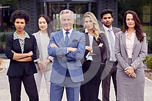 Portrait Of Multi-Cultural Business Team Outside Modern Office Building 