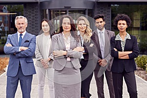 Portrait Of Multi-Cultural Business Team Outside Modern Office Building 