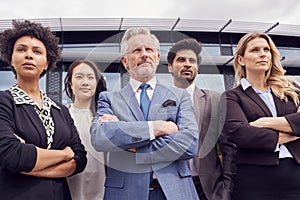 Portrait Of Multi-Cultural Business Team Outside Modern Office Building 