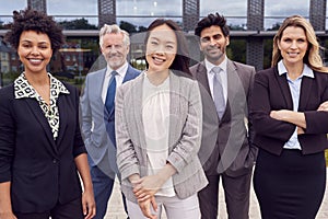 Portrait Of Multi-Cultural Business Team Outside Modern Office Building 