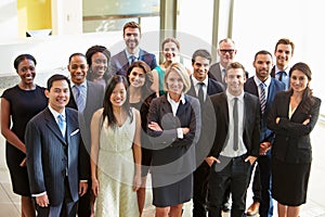 Portrait Of Multi-Cultural Office Staff Standing In Lobby photo