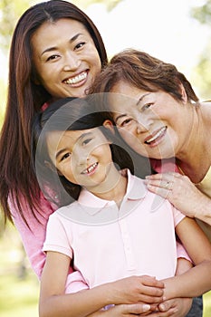 Portrait multi-generation Asian females in park