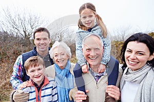 Portrait Of Multi Generation Family On Countryside Walk