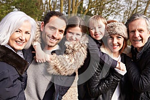 Portrait Of Multi Generation Family On Countryside Walk