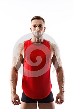 Portrait of a muscular male model against white background