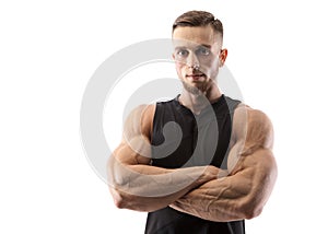 Portrait of a muscular male model on white background