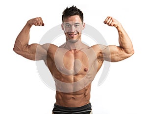 Portrait of muscular man flexing his biceps photo