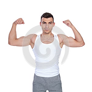 Portrait of muscular man in undershirt flexing his biceps