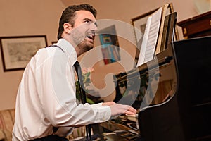 Portrait of music performer playing piano