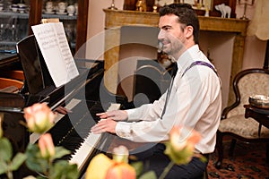 Portrait of music performer playing piano