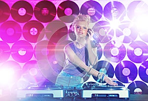 Portrait, music and woman dj with mixer on wall background for entertainment at club, disco or party. Concert, dance or