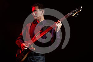 Portrait of musician with bass guitar