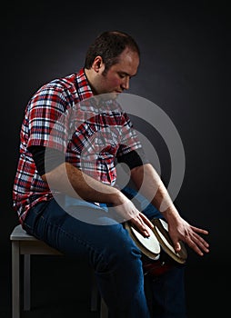 Portrait of musician with bongo