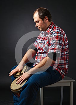 Portrait of musician with bongo