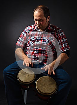 Portrait of musician with bongo