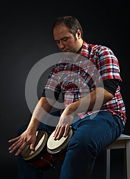 Portrait of musician with bongo