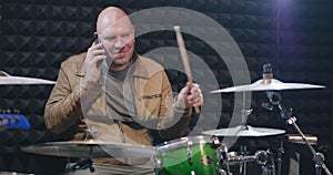 Portrait of musician holding drumstick