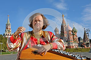Portrait of a musician with music instrument gusli
