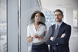 Portrait Of New Business Owners In Empty Office