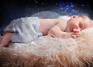 A portrait newborn lies on a fur blanket, cute, sleeping, tiny baby. Mom and her baby. Maternity.