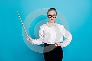 Portrait of nice attractive coacher pointing wooden stick copy space science isolated over bright blue color background