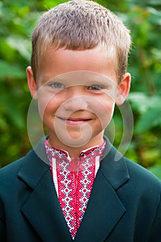 Portrait of nice little schoolboy