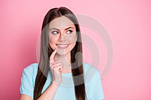 Portrait of nice lovely girl look good copyspace touch chin finger feel curious isolated over pink color background