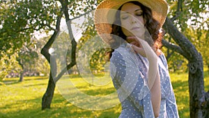 Portrait of nice woman in the garden