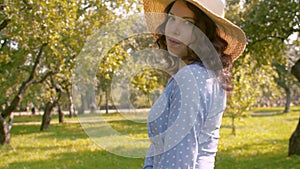 Portrait of nice woman in the garden