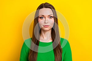 Portrait of nice young girl calm face long hairstyle look camera isolated on bright yellow color background