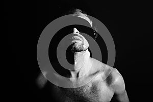 Portrait of nude young men blindfolded