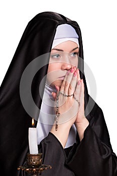 Portrait of nun on a white background