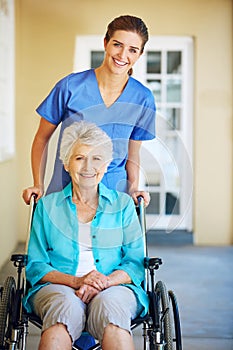 Portrait, nurse or happy old woman in wheelchair in hospital clinic helping an elderly patient for support. Trust, smile