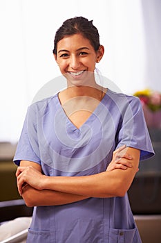 Portrait Of Nurse In Hospital Wearing Scrubs