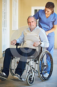 Portrait, nurse or old man in wheelchair in hospital helping an elderly patient for trust or support in clinic. Happy