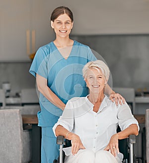 Portrait, nurse and senior woman in wheelchair in home kitchen, support and comfort. Happy caregiver, elderly person