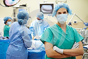 Portrait Of Nurse Working In Operating Theatre