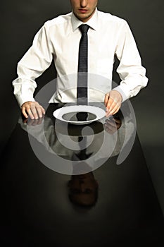 Portrait of office manager eating petroleum