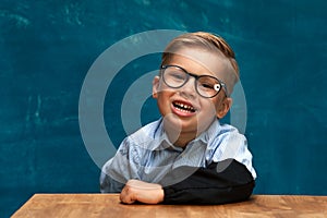 Portrait of office worker child wearing eyeglasses