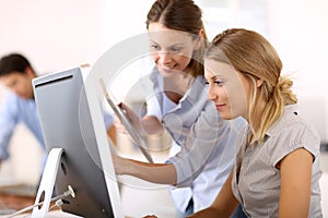 Portrait of office workers with tablet and computer