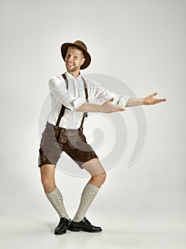 Portrait of Oktoberfest man, wearing a traditional Bavarian clothes photo