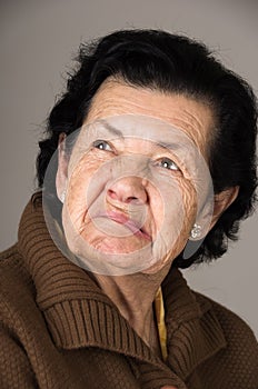 Portrait of old cranky woman grandmother