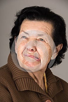 Portrait of old cranky woman grandmother