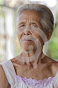 Portrait old grey haired woman, Asia