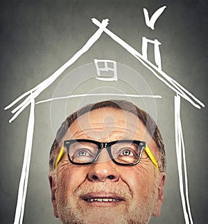 Portrait of Old Man with glasses looking up