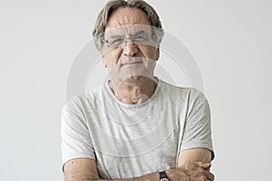 Portrait of old man smiling at the camera