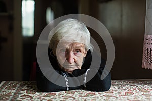 Portrait of a old woman. Care for lonely pensioners.