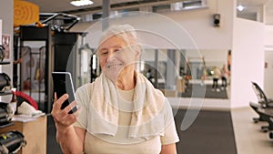 Portrait old woman in gym. Physical culture for older people. Training and individual courses. Happy people smile